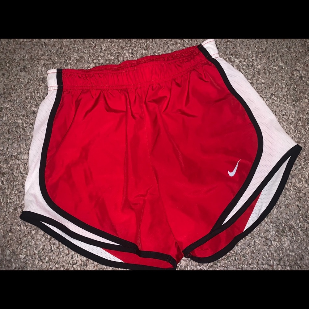Red Nike shorts